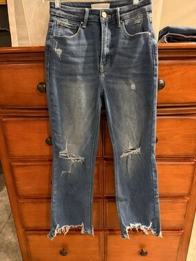Distressed Women's Blue Denim Jeans - Mid Wash